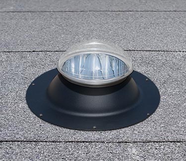 NLES tubular skylight on flat asphalt roof thumb