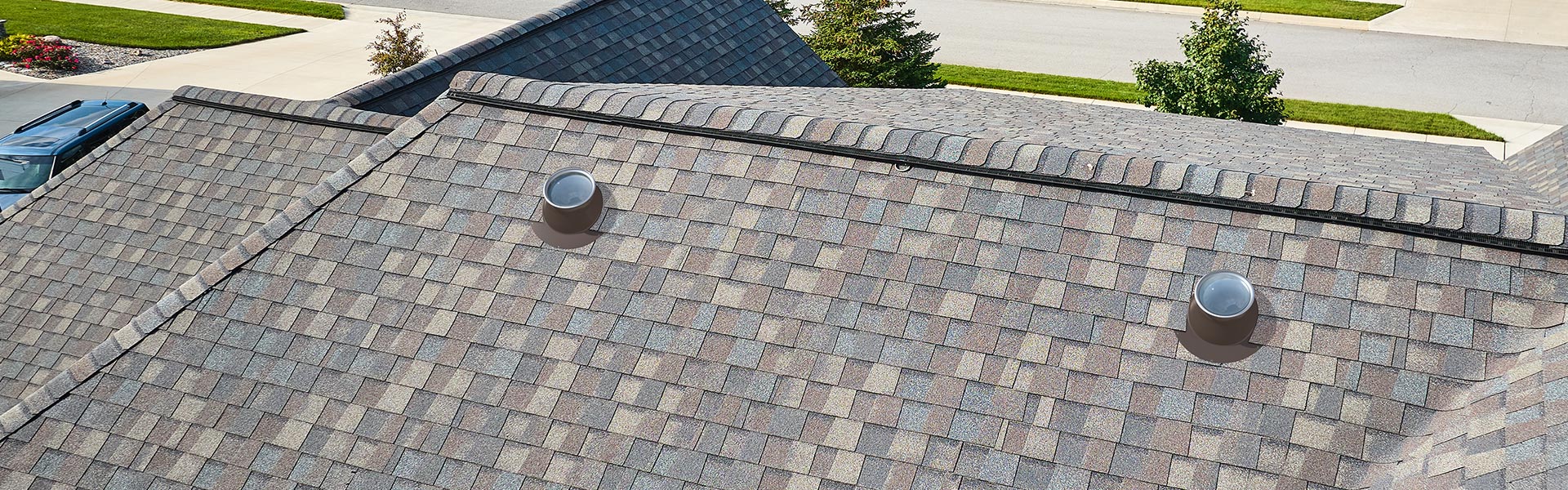 Aerial view of two NLES tubular skylight on residential home